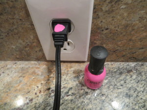 Nail polish on outlet plug